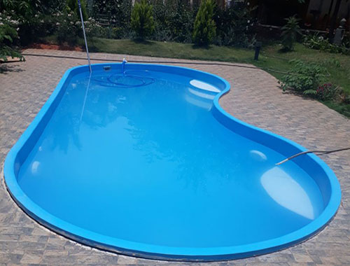 Bean Shaped Swimming Pool Manufacturer in Ludhiana